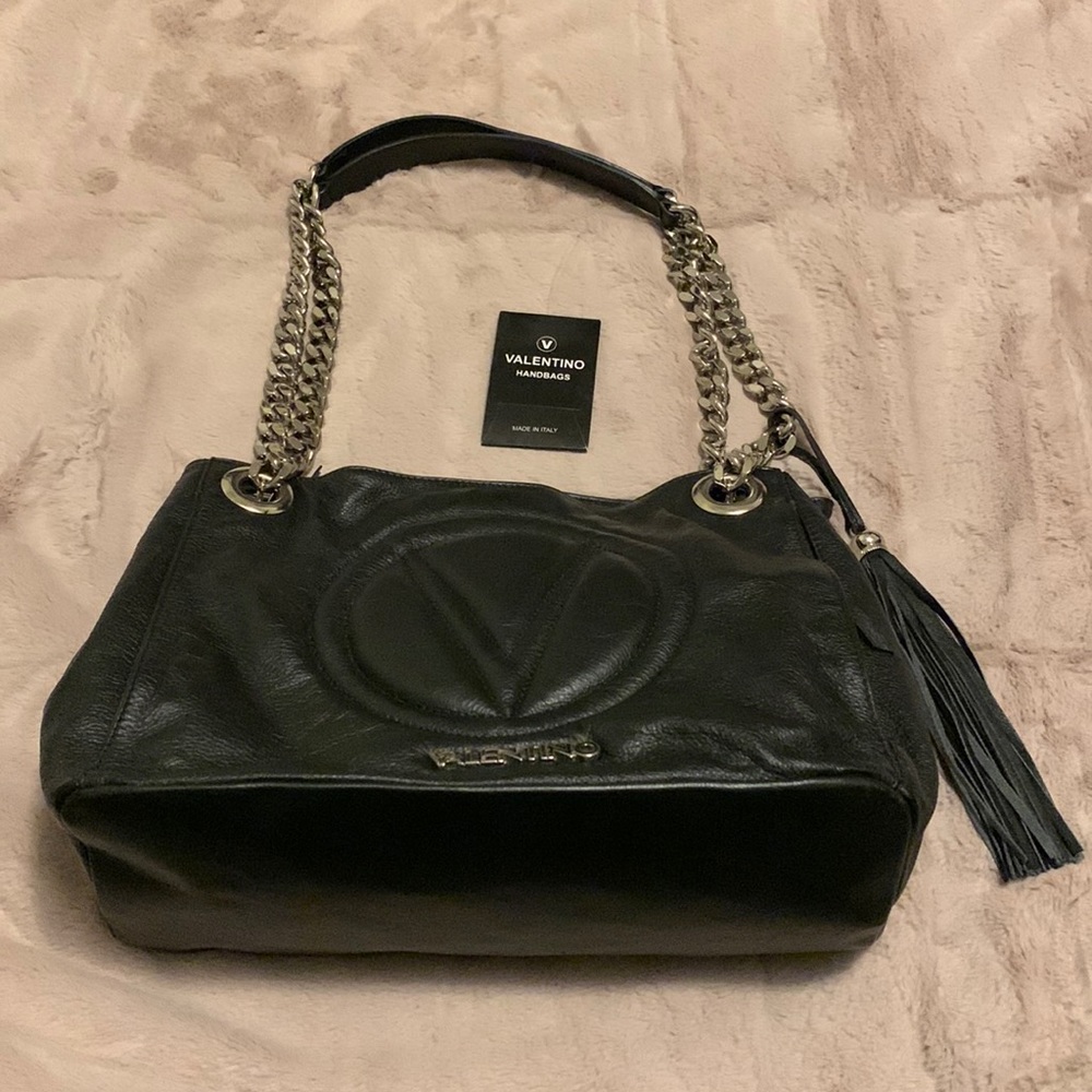 Black Valentino by Mario Valentino Spa.
